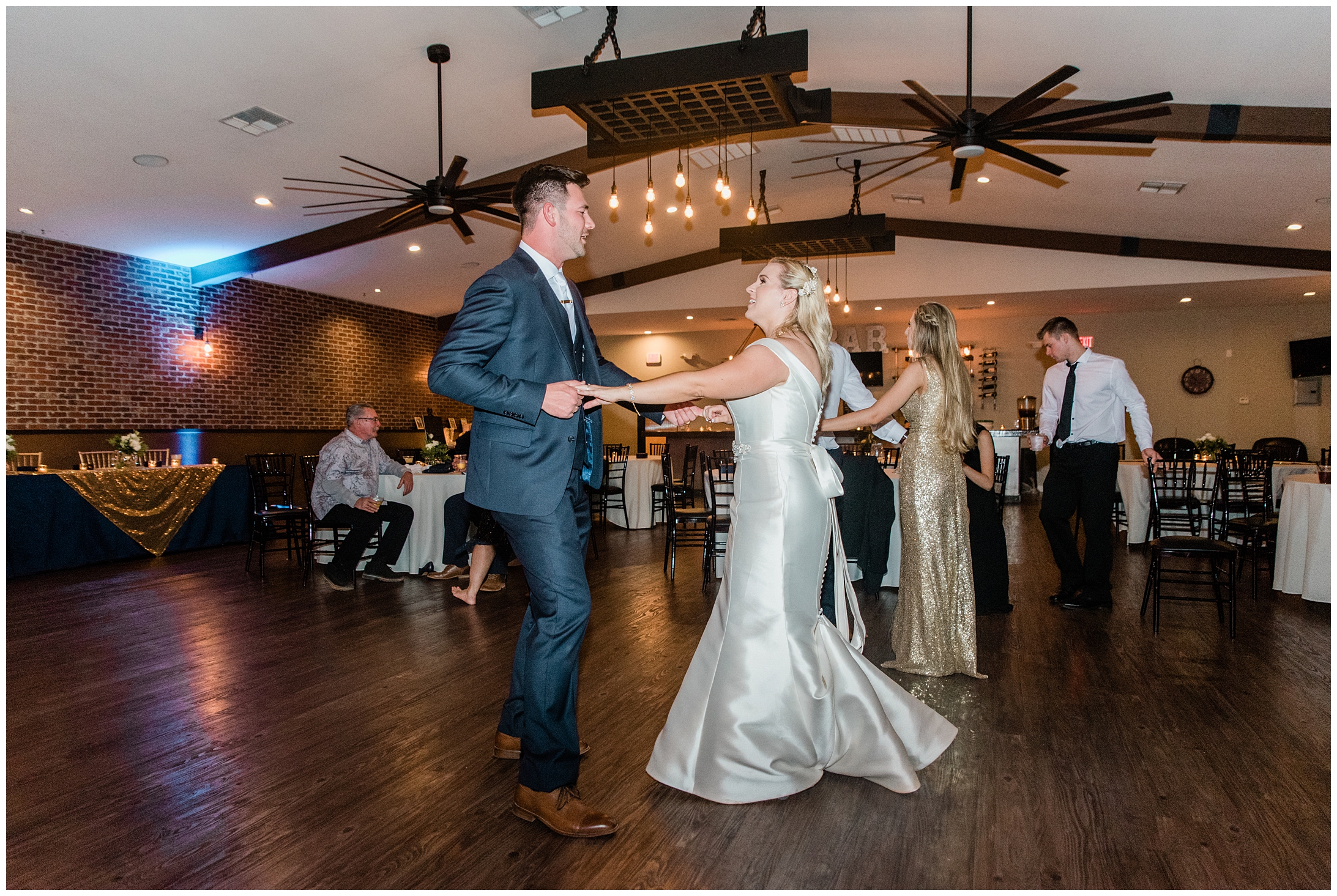 a man and woman dancing at their wedding