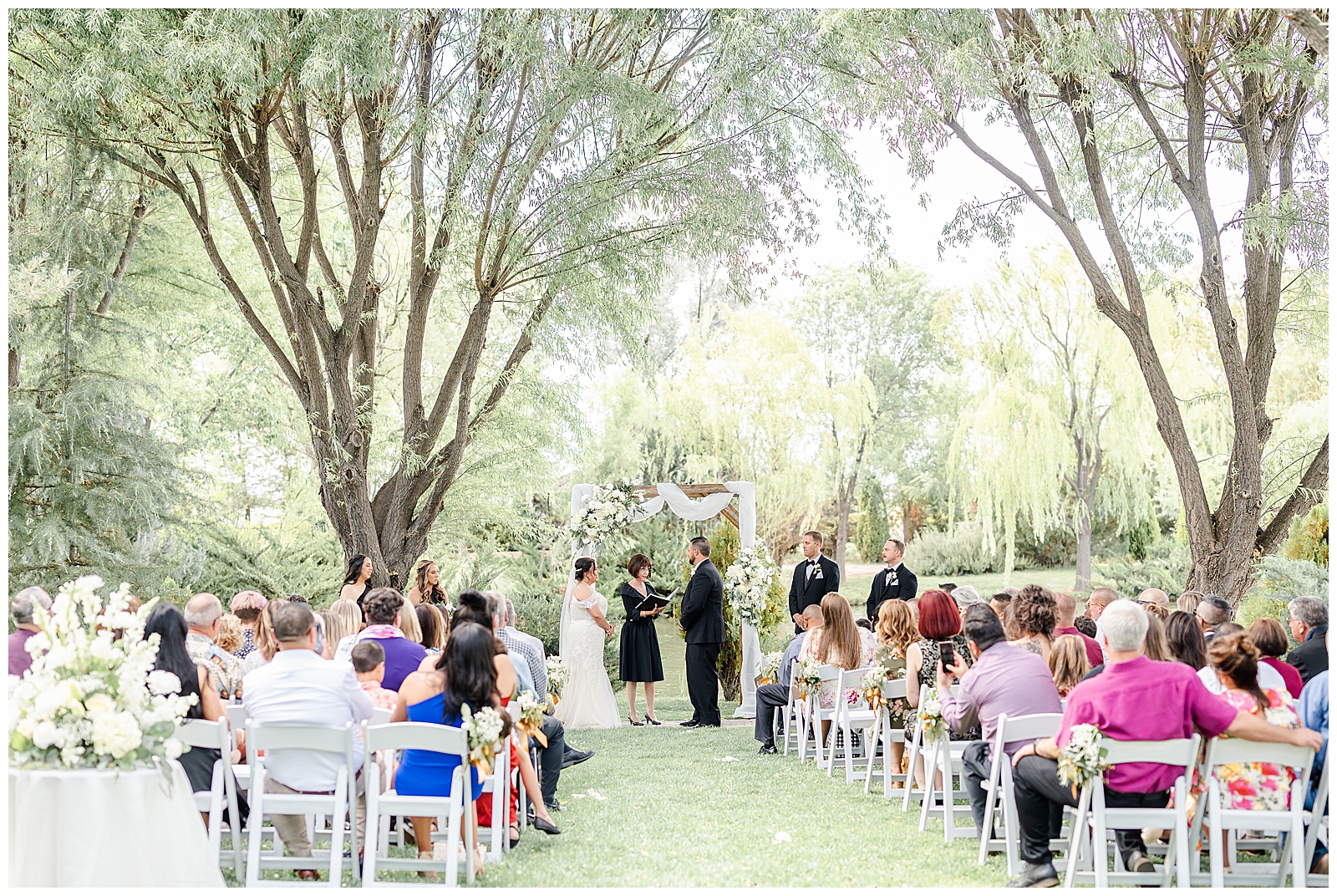 wedding ceremony outdoors under trees